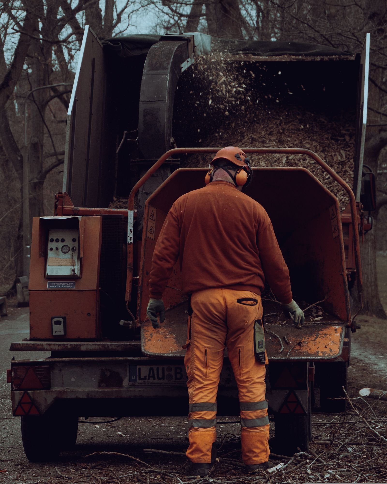 Stump grinder machine removing a tree stump in a Camillus NY yard